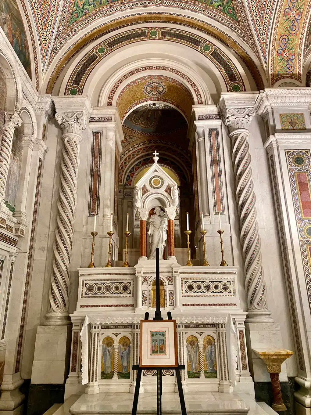 The mosaic-covered interior of the Cathedral Basilica of St. Louis, looking toward the chancel and the domes.